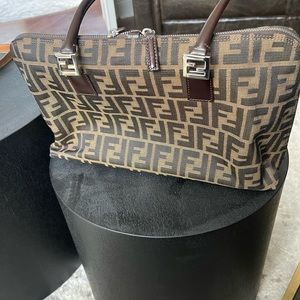 Fendi bag is in very good condition . The inside and out is clean.